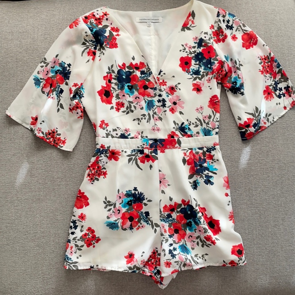 White Floral Romper with pockets and side zipper